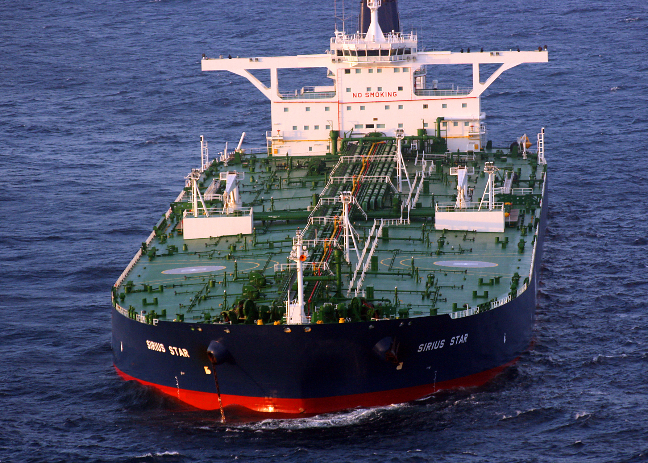 Brent Surges Back Toward $95 on an 11th Night of Iran Strikes. Alphabet and Tesla Report After the Close.